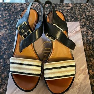 Franco Sarto black & tan wedge sandal has buckle closure